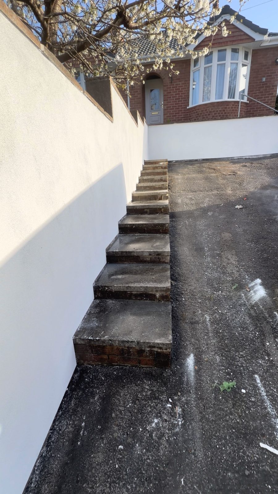 Completed exterior wall finish on a residential frontage